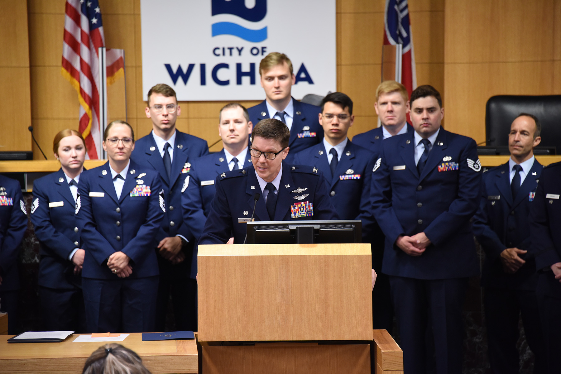 Col. Jason Knobbe, commander, 184th Wing, make comments to the Wichita City Council.